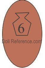 French doll shoe mark 6 inside a keystone or jar symbol