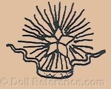 Renée De Wouilt doll mark five pointed star with rays & ribbon