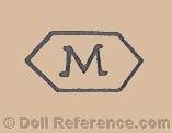 Marienfeld Porzellanfabrik  doll mark M on a six sided shield
