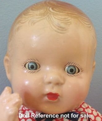 1921-1922 Atlas Doll & Toy Company Toddles doll, 11" tall all composition bent limb baby.